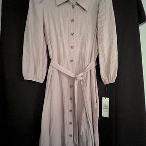 Calvin Klein dress. NWT size 12. Pockets, tie belt, button down. Pale mauve/pink